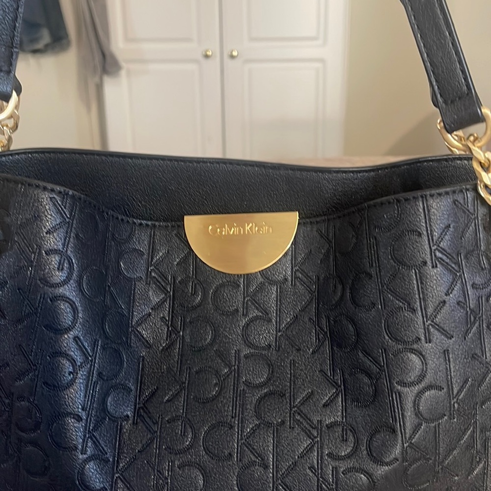 Black Shoulder Bag with combination Gold chain & black leather strap.